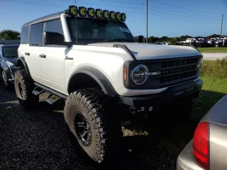2022 Ford Bronco with VIN 1FMEE5BP4NLB45977, listed as a Copart auction lot 74874914 with 13,719 mi miles and Salvage Title. Bid and sale history available at DreamBid. Image 4.