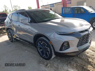 2021 Chevrolet Blazer RS z VIN 3GNKBERS7MS556879, wystawiony jako IAAI lot #42441675 z przebiegiem 123 484 mil mil oraz . Historia ofert i sprzedaży dostępna na DreamBid. Obrazek 1.