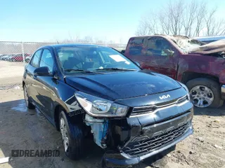 2023 Kia Rio S with VIN 3KPA25AD9PE511821, listed as a IAAI auction lot 41860387 with 18,282 mi miles and . Bid and sale history available at DreamBid. Image 1.