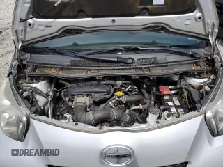 2012 Scion iQ with VIN JTNJJXB03CJ015321, listed as a Copart auction lot 54332355 with 63,439 mi miles and Salvage title. Bid and sale history available at DreamBid. Image 11.