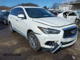 2020 Infiniti QX60 LUXE with VIN 5N1DL0MM0LC513849, listed as a IAAI auction lot 41633049 with 65,413 mi miles. Bid and sale history available at carsss.com. Image 1.