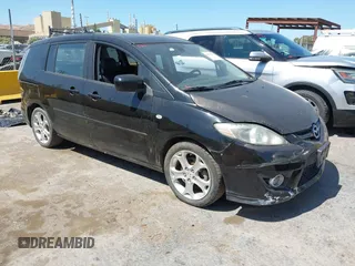 2009 Mazda 5 Touring z VIN JM1CR29L390343152, wystawiony jako IAAI lot #42270476 z przebiegiem 176 292 mil mil oraz . Historia ofert i sprzedaży dostępna na DreamBid. Obrazek 1.