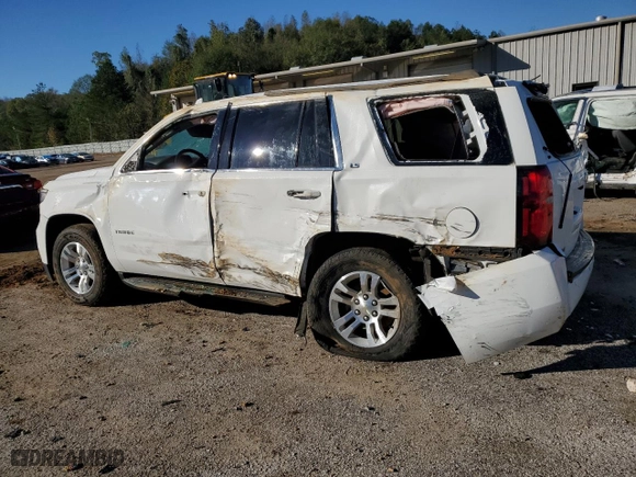 2015 Chevrolet Tahoe LS with VIN 1GNSKAKCXFR546803, listed as a Copart auction lot 81128974 with 131,482 mi miles and Salvage Title. Bid and sale history available at carsss.com. Image 2.