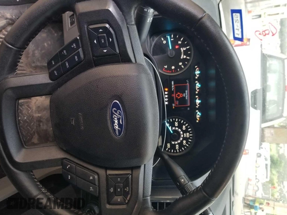 2019 Ford F-150 XL with VIN 1FTFW1E42KKF27037, listed as a IAAI auction lot 42777832 with 169,179 mi miles and . Bid and sale history available at DreamBid. Image 14.