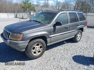 2002 Jeep Grand Cherokee z VIN 1J4GX38S92C149908, wystawiony jako IAAI lot #41782530 z przebiegiem 145 195 mil mil oraz . Historia ofert i sprzedaży dostępna na DreamBid. Obrazek 2.
