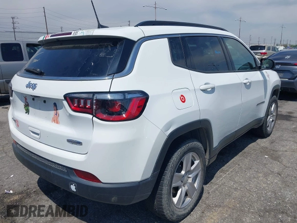 2022 Jeep Compass Latitude with VIN 3C4NJDBB6NT235666, listed as a IAAI auction lot 42161777 with 68,212 mi miles and . Bid and sale history available at DreamBid. Image 4.