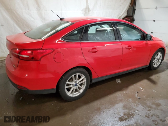 2015 Ford Focus SE with VIN 1FADP3F20FL205273, listed as a Copart auction lot 58627814 with 198,266 mi miles and Salvage title. Bid and sale history available at DreamBid. Image 3.