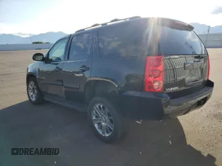 2007 GMC Yukon SLT with VIN 1GKFK13007J148406, listed as a Copart auction lot 67175134 with 175,936 mi miles and Salvage Title. Bid and sale history available at carsss.com. Image 2.