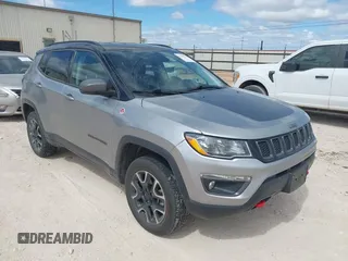2020 Jeep Compass Trailhawk z VIN 3C4NJDDB5LT171727, wystawiony jako IAAI lot #41844523 z przebiegiem 103 952 mil mil oraz . Historia ofert i sprzedaży dostępna na DreamBid. Obrazek 1.