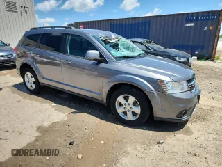 2012 Dodge Journey SXT с VIN 3C4PDDBG8CT396674, выставлен на аукционе Copart как лот 62953425 с пробегом 123 967 миль миль и На запчасти • Non repairable. История ставок и продаж доступна на DreamBid. Изображение 4.