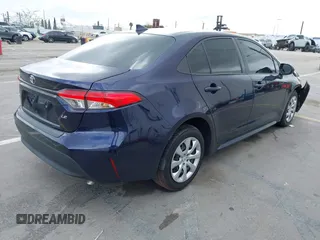 2023 Toyota Corolla LE with VIN JTDB4MEE5PJ006860, listed as a IAAI auction lot 41787964 with 18,883 mi miles. Bid and sale history available at carsss.com. Image 4.