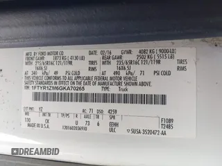2016 Ford Transit Cargo with VIN 1FTYR1ZM6GKA70265, listed as a IAAI auction lot 41209043 with 156,112 mi miles and . Bid and sale history available at DreamBid. Image 9.