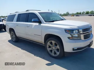 2020 Chevrolet Suburban Premier with VIN 1GNSCJKCXLR263570, listed as a IAAI auction lot 41980013 with Not provided miles and . Bid and sale history available at DreamBid. Image 1.