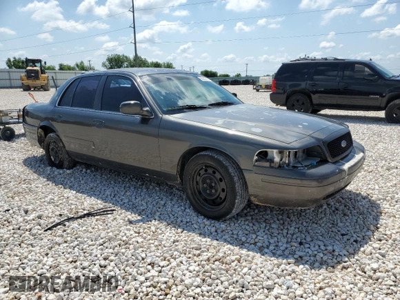 2007 Ford Police Interceptor with VIN 2FAFP71W27X152722, listed as a Copart auction lot 56252475 with 105,657 mi miles and Salvage title. Bid and sale history available at DreamBid. Image 4.