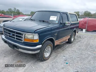 1995 Ford Bronco Custom with VIN 1FMEU15H2SLB87303, listed as a IAAI auction lot 41763857 with 1 mi miles. Bid and sale history available at carsss.com. Image 2.