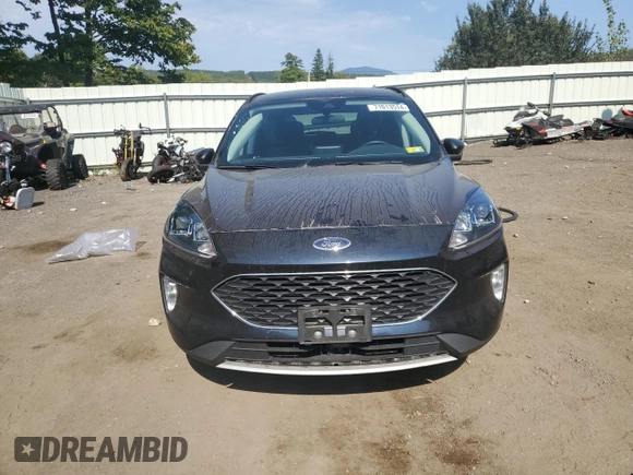 2021 Ford Escape SEL Hybrid z VIN 1FMCU9CZ7MUA94260, wystawiony jako Copart lot #71013514 z przebiegiem Nie podano mil oraz Szkoda całkowita • Salvage title. Historia ofert i sprzedaży dostępna na DreamBid. Obrazek 5.