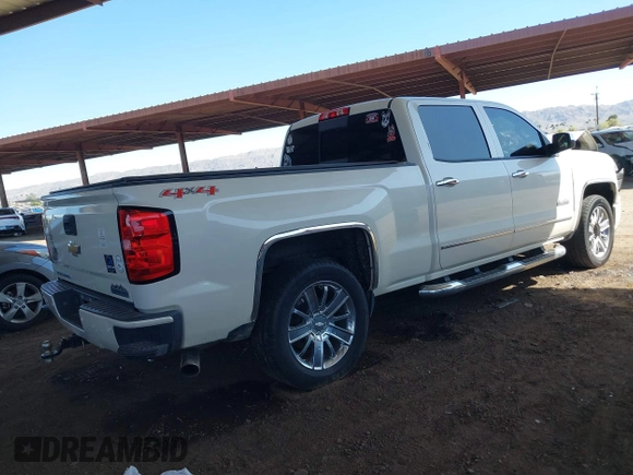 2014 Chevrolet Silverado 1500 High Country with VIN 3GCUKTEC2EG269961, listed as a IAAI auction lot 42054082 with 165,209 mi miles and . Bid and sale history available at DreamBid. Image 4.