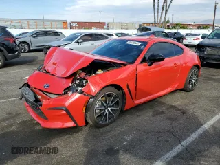 2023 Toyota GR86 with VIN JF1ZNBC11P8759329, listed as a Copart auction lot 80328044 with 10,616 mi miles and Salvage Title. Bid and sale history available at carsss.com. Image 1.