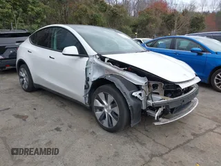 2023 Tesla Model Y Long Range z VIN 7SAYGDEE4PF621640, wystawiony jako IAAI lot #41796502 z przebiegiem 68 484 mil mil oraz . Historia ofert i sprzedaży dostępna na DreamBid. Obrazek 1.