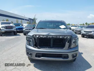 2018 Nissan Titan SV with VIN 1N6AA1E6XJN525640, listed as a IAAI auction lot 42139103 with 88,338 mi miles and . Bid and sale history available at DreamBid. Image 12.
