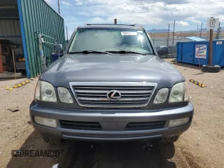 2004 Lexus LX 470 z VIN JTJHT00W743541854, wystawiony jako Copart lot #58053475 z przebiegiem 311 296 mil mil oraz Tytuł czysty. Historia ofert i sprzedaży dostępna na DreamBid. Obrazek 5.