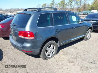 2005 Volkswagen Touareg 3.2L V6 with VIN WVGZG77L65D079228, listed as a IAAI auction lot 41832037 with Not Provided miles and . Bid and sale history available at DreamBid. Image 4.