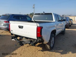 2024 Toyota Tacoma 4WD SR5 with VIN 3TMLB5JN2RM029041, listed as a IAAI auction lot 41779530 with 7,663 mi miles. Bid and sale history available at carsss.com. Image 4.