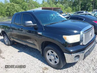 2012 Toyota Tundra z VIN 5TFRY5F17CX127160, wystawiony jako IAAI lot #42256016 z przebiegiem 203 648 mil mil oraz . Historia ofert i sprzedaży dostępna na DreamBid. Obrazek 1.