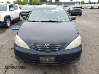 2004 Toyota Camry LE z VIN 4T1BE32KX4U380789, wystawiony jako Copart lot #57142645 z przebiegiem 226 106 mil mil oraz Szkoda całkowita • Salvage title. Historia ofert i sprzedaży dostępna na DreamBid. Obrazek 5.