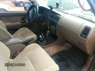 1998 Toyota 4Runner SR5 z VIN JT3HN86R3W0177146, wystawiony jako IAAI lot #42073056 z przebiegiem 318 147 mil mil oraz . Historia ofert i sprzedaży dostępna na DreamBid. Obrazek 5.
