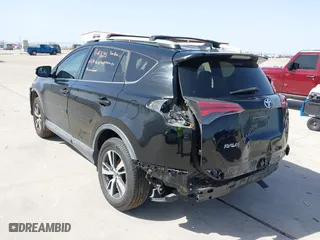 2016 Toyota RAV4 XLE with VIN 2T3WFREV9GW292772, listed as a IAAI auction lot 41727898 with 117,922 mi miles. Bid and sale history available at carsss.com. Image 3.