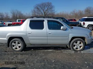 2009 Honda Ridgeline RTL with VIN 2HJYK16569H002832, listed as a IAAI auction lot 41683669 with 154,220 mi miles and . Bid and sale history available at DreamBid. Image 13.