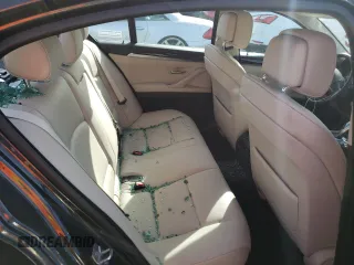 2013 BMW 5 Series 528i xDrive with VIN WBAXH5C55DD106628, listed as a Copart auction lot 49565214 with 123,709 mi miles and Salvage Title. Bid and sale history available at carsss.com. Image 10.