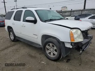 2011 GMC Yukon SLE with VIN 1GKS1AE02BR224975, listed as a Copart auction lot 47647715 with 115,676 mi miles and Salvage Title. Bid and sale history available at carsss.com. Image 4.