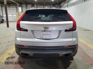 2020 Cadillac XT4 AWD Premium Luxury with VIN 1GYFZDR40LF055380, listed as a Copart auction lot 43933755 with 54,646 mi miles and Salvage Title. Bid and sale history available at DreamBid. Image 6.