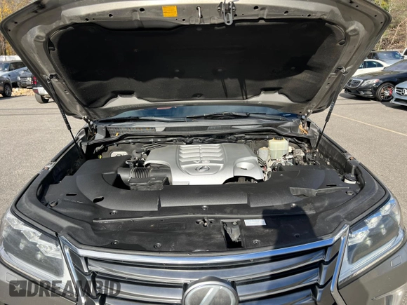 2016 Lexus LX 570 with VIN JTJHY7AX7G4203810, listed as a Copart auction lot 80800914 with 296,703 mi miles and Clean Title. Bid and sale history available at DreamBid. Image 8.