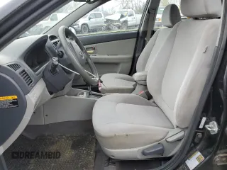 2009 Kia Spectra EX z VIN KNAFE222295664027, wystawiony jako Copart lot #50788635 z przebiegiem 118 563 mil mil oraz Czysty tytuł • Clean title. Historia ofert i sprzedaży dostępna na DreamBid. Obrazek 7.
