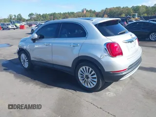 2016 FIAT 500X Lounge z VIN ZFBCFXDT2GP363767, wystawiony jako IAAI lot #37885612 z przebiegiem 74 859 mil mil oraz . Historia ofert i sprzedaży dostępna na DreamBid. Obrazek 3.