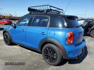 2013 MINI Countryman S with VIN WMWZC3C51DWP23167, listed as a Copart auction lot 63933185 with 72,329 mi miles and Salvage title. Bid and sale history available at DreamBid. Image 2.