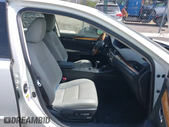 2014 Lexus ES 300h with VIN JTHBW1GG9E2068257, listed as a IAAI auction lot 42043095 with 130,560 mi miles and . Bid and sale history available at DreamBid. Image 5.