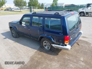 2001 Jeep Cherokee Sport with VIN 1J4FF48S91L513926, listed as a IAAI auction lot 42671363 with 234,233 mi miles and . Bid and sale history available at DreamBid. Image 3.