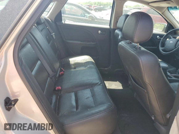 2009 Ford Taurus Limited z VIN 1FAHP25W09G118860, wystawiony jako Copart lot #54604575 z przebiegiem 212 886 mil mil oraz Szkoda całkowita • Salvage title. Historia ofert i sprzedaży dostępna na DreamBid. Obrazek 10.