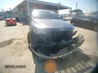 2018 Jeep Grand Cherokee Laredo E with VIN 1C4RJEAG9JC397382, listed as a Copart auction lot 56550815 with 72,239 mi miles and Salvage title. Bid and sale history available at DreamBid. Image 14.