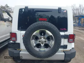 2011 Jeep Wrangler Sahara with VIN 1J4AA5D15BL538240, listed as a IAAI auction lot 41793836 with 172,528 mi miles and . Bid and sale history available at carsss.com. Image 16.