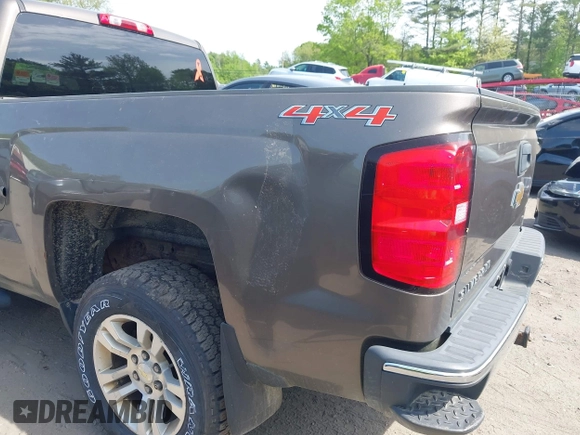 2015 Chevrolet Silverado 1500 LT with VIN 1GCUKREC8FF201315, listed as a IAAI auction lot 42250910 with 137,736 mi miles and . Bid and sale history available at DreamBid. Image 6.