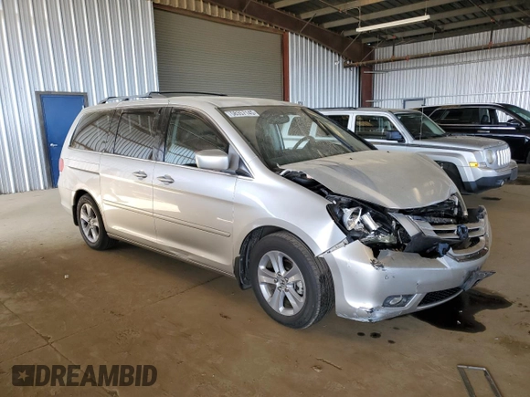 2008 Honda Odyssey Touring with VIN 5FNRL38998B052646, listed as a Copart auction lot 58357145 with 200,943 mi miles and Salvage title. Bid and sale history available at DreamBid. Image 4.