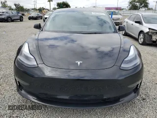 2022 Tesla Model 3 Long Range with VIN 5YJ3E1EB6NF334914, listed as a Copart auction lot 53876415 with 52,875 mi miles and Salvage Title. Bid and sale history available at carsss.com. Image 5.