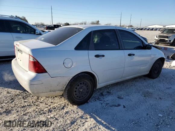 2007 Ford Focus S with VIN 1FAFP34N47W243028, listed as a Copart auction lot 55147695 with 218,672 mi miles and Salvage title. Bid and sale history available at DreamBid. Image 3.