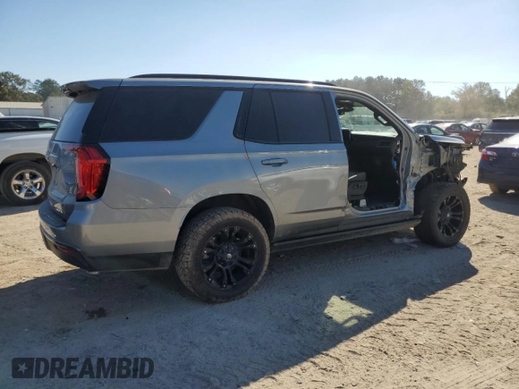 2023 GMC Yukon AT4 with VIN 1GKS2CKD6PR137989, listed as a Copart auction lot 76806404 with 30,732 mi miles and Salvage Title. Bid and sale history available at carsss.com. Image 3.