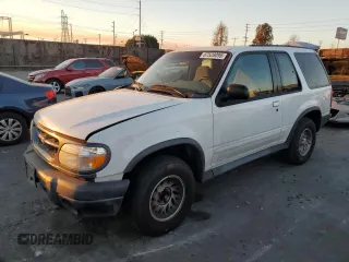 1999 Ford Explorer Sport z VIN 1FMYU22X1XUA31138, wystawiony jako Copart lot #87529095 z przebiegiem 60 805 mil mil oraz Czysty tytuł • Clean title. Historia ofert i sprzedaży dostępna na DreamBid. Obrazek 1.